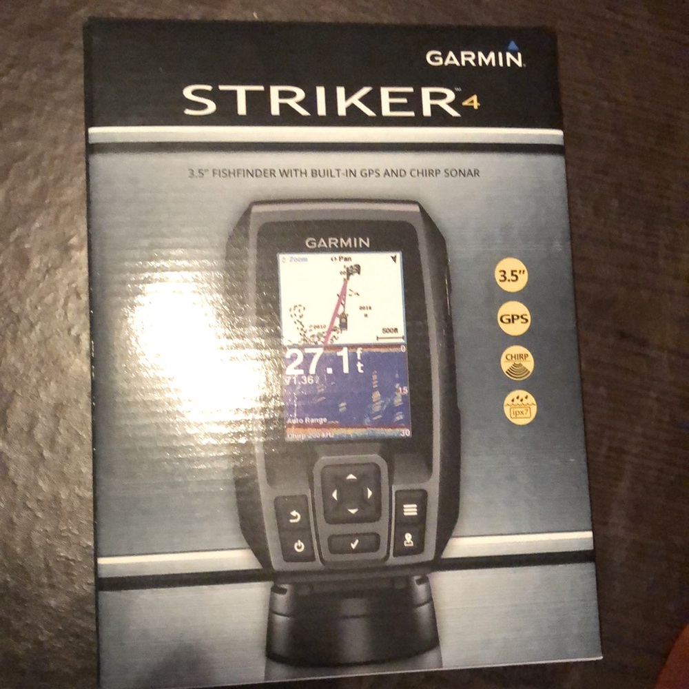 NEVER used Garmin Striker4. Brand New In Box. Fish & Depth Finder.